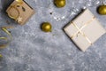 Top view of Christmas presents, ornaments on the grey table.Concept of Christmas preparation Royalty Free Stock Photo