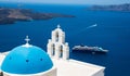 Top view from the church blue dome to a cruise ship and the seascape in Santorini, Greece Royalty Free Stock Photo