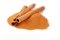 Top view cinnamon sticks and powder, isolated on white background Royalty Free Stock Photo