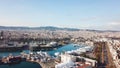 Top view of the city with the Bay and yachts. Stock. Beautiful aerial view of city port. Aerial view of white yachts and