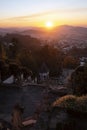 Top view city of Braga from stairway the church of Bom Jesus do Monte in golden sunset light, Portugal.