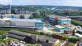 Top view on of city and factory complexes. Footage. Panorama of industrial production in city during day. Industrial