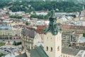 Top view from city hall tower on old high catholic cathedral tower in Lviv city, Ukraine Royalty Free Stock Photo