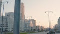 Top view of city highway lights on background of white modern building. Stock footage. Busy city highway with lanterns Royalty Free Stock Photo