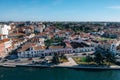 .Top view of the city, narrow streets and roofs of houses with red tiles Cascais