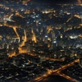 Top view of the city at night with illuminated streets