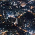 Top view of the city at night with illuminated streets