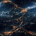 Top view of the city at night with illuminated streets