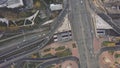 Top view city traffic of highway, logistics. Clip. Aerial top view of road junction from above, automobile traffic and Royalty Free Stock Photo