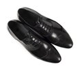 Top view of classic black leather shoes on white Royalty Free Stock Photo