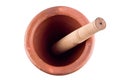 Top View of clay mortar and wood pestle on white background cooking kitchenware object isolated Royalty Free Stock Photo