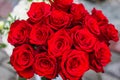 Top view of close up bouquet of red roses in selective focus at some romantic event like wedding bithday or engagement