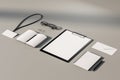 Top view and close up of empty office supplies on white table. Clipboard, notepad, bad, envelope. Mock up, 3D Rendering