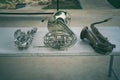 Top view, close-up, jazz orchestra instrument, french horn and saxophone lying on the table. Royalty Free Stock Photo