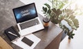 Top view. Close-up of laptop with inscription on monitor- cloud library on table. Empty workplace without people. Online education