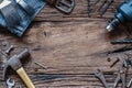 Top view close up of variety handy tools and jeans on wood backg Royalty Free Stock Photo