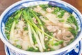 Top view close-up Vietnamese Rice Noodle Pho Bo bowl with green onions Royalty Free Stock Photo
