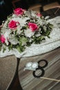 Top view closeup of a beautiful bouquet of flowers placed on the dress next to 18th birthday decor