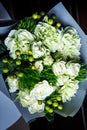 Top view closeup exclusive bouquet of big white roses and fresh greenery Royalty Free Stock Photo