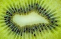 Top view closeup of fresh ripe green kiwi fruit flesh with black seed Royalty Free Stock Photo