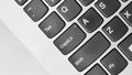 Top view closeup of the keyboard on a silver laptop