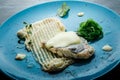 top view closeup mashed potatoes, sea kale, and baked fish fillet Royalty Free Stock Photo