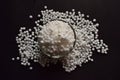 Top View of Closeup Pearls or white sago seeds balls in a Transparent Glass Bowl On isolated Black Background