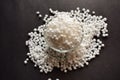 Top View of Closeup Pearls or white sago seeds balls in a Transparent Glass Bowl On isolated Black Background