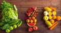 Top view closeup studio shot group assortment of green red and orange colors healthy fresh raw diet ingredient delicious tasty