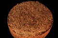 top view closeup whole round baked rye wheat bread with sesame seeds