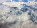 Top view of the clouds from the airplane window.Flying Royalty Free Stock Photo