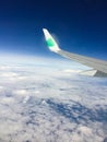 Top view of the clouds from the airplane window.Flying Royalty Free Stock Photo