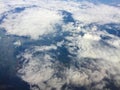 Top view of the clouds from the airplane window.Flying Royalty Free Stock Photo