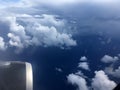 The top view of clouds and sky from an airplane window Royalty Free Stock Photo