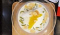 Top view of coconut milk ice cream with peanut, sliced jackfruit and Lod Chong in glass bowl. Royalty Free Stock Photo