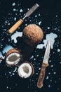 top view of coconuts, chisel, knife and coconut milk Royalty Free Stock Photo