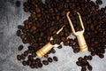 Top View.The coffee beans are in a brown burlap sack, laid on a black-gray ground, and with a wooden spoon to scoop the coffee Royalty Free Stock Photo