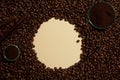 Top view of coffee beans displayed on beige background create an empty space for displayed product. Coffee grounds with countless Royalty Free Stock Photo