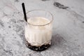 Top view coffee cocktail, Black Russian, liquor in glasses with coffee beans on a gray background, concrete, selective Royalty Free Stock Photo