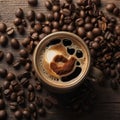 Top view of Coffee Cup and Beans on Wooden Table. Cup of hot aromatic coffee and coffee beans on wooden table. Warm cup of coffee Royalty Free Stock Photo