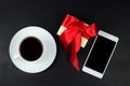 Offee cup,gift box and mobile phone Royalty Free Stock Photo