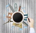 Top view of a coffee cup and the hand draws colourful sketches of the most famous cities in the world. The concept of travelling. Royalty Free Stock Photo