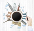 Top view of a coffee cup and the hand draws colourful sketches of the most famous cities in the world. The concept of travelling. Royalty Free Stock Photo