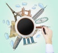 Top view of a coffee cup and the hand draws colourful sketches of the most famous cities in the world. The concept of travelling. Royalty Free Stock Photo