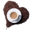Top view of coffee cup with heart shaped beans Royalty Free Stock Photo