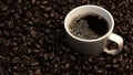 Top view of coffee or espresso with piles of coffee beans. Close up. Comestible.