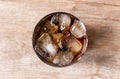 Top view of cola and ice in clear glass Royalty Free Stock Photo