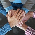 Top view, collaboration and hands together for teamwork, team building or solidarity. Cooperation, hand huddle and group