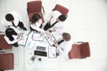 Top view.colleagues shaking hands before a working meeting at the office