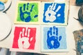 Top view of finger painting. Colored hand print of watercolor. P